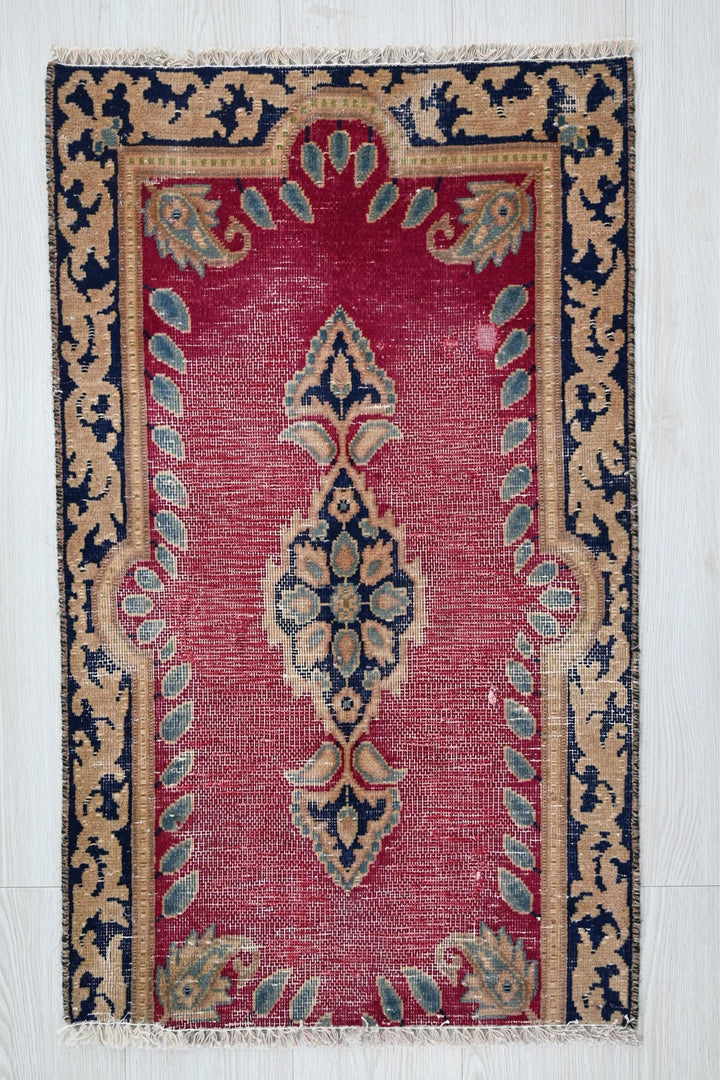 red Accent rug 1' 8" x 2' 8"