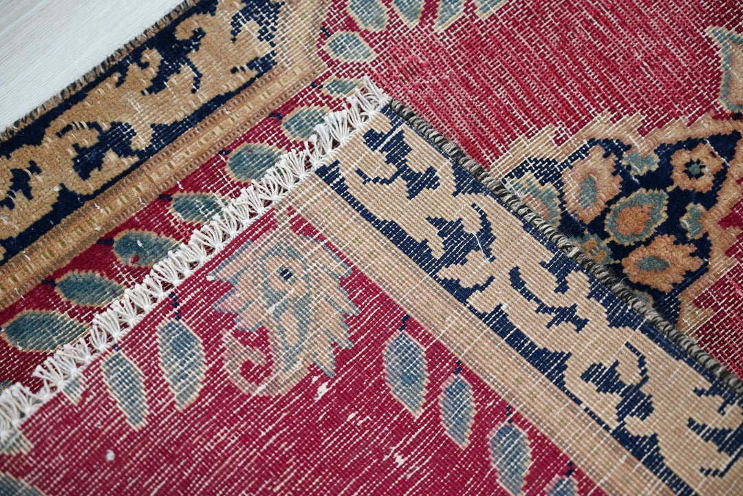 red Accent rug 1' 8" x 2' 8"