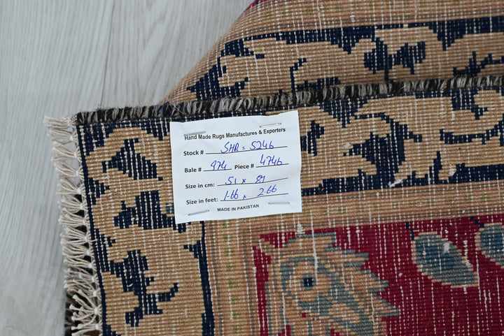 red Accent rug 1' 8" x 2' 8"