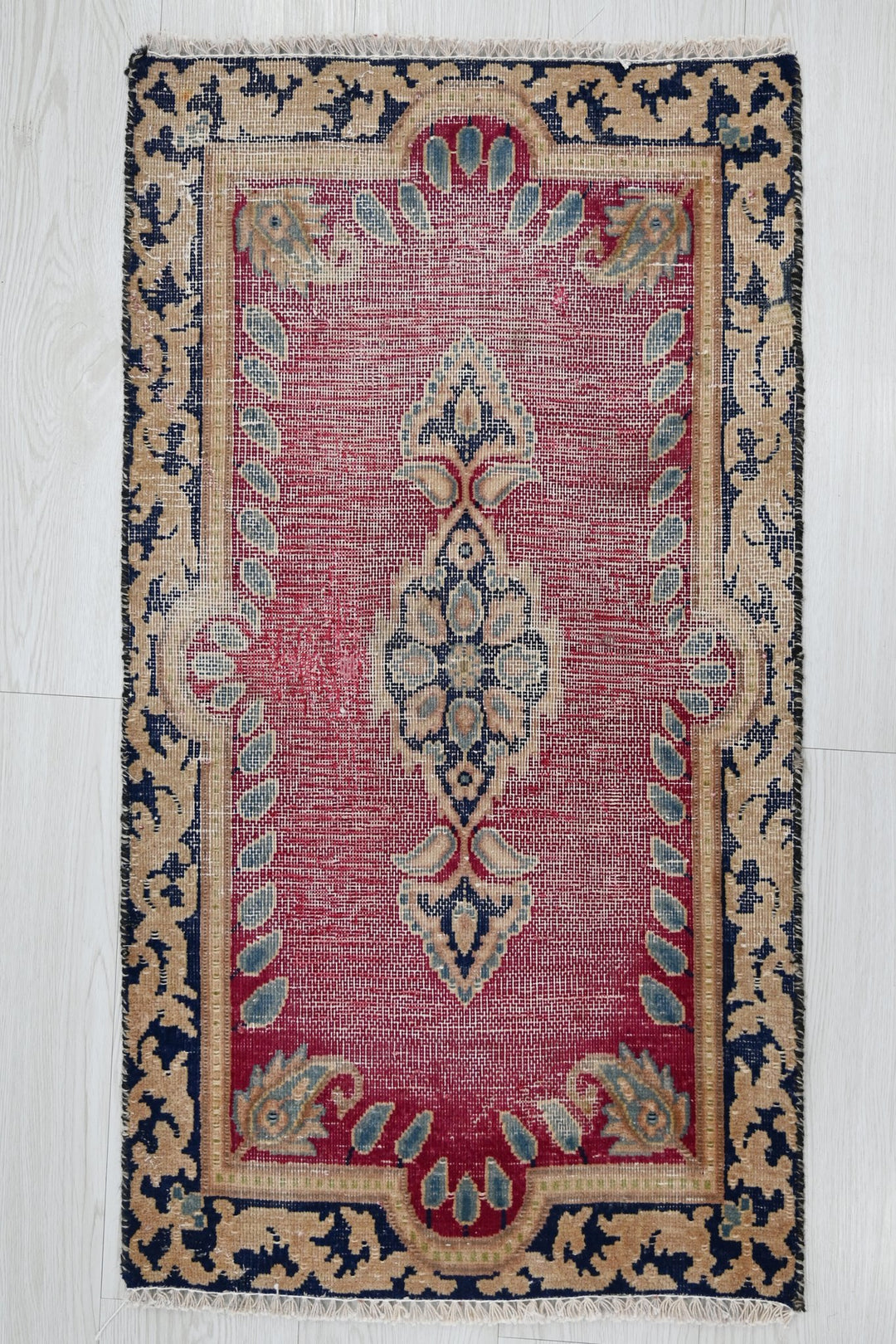 red Accent rug 1' 8" x 3' 1"