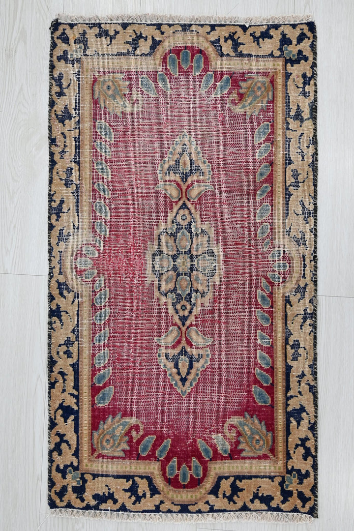 red Accent rug 1' 8" x 3' 1"