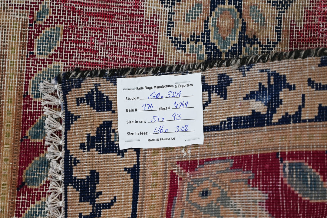 red Accent rug 1' 8" x 3' 1"