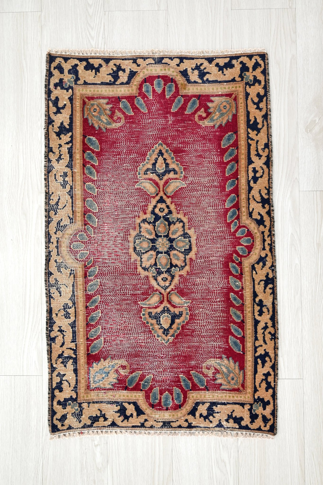 red Accent rug 1' 9" x 3' 0"