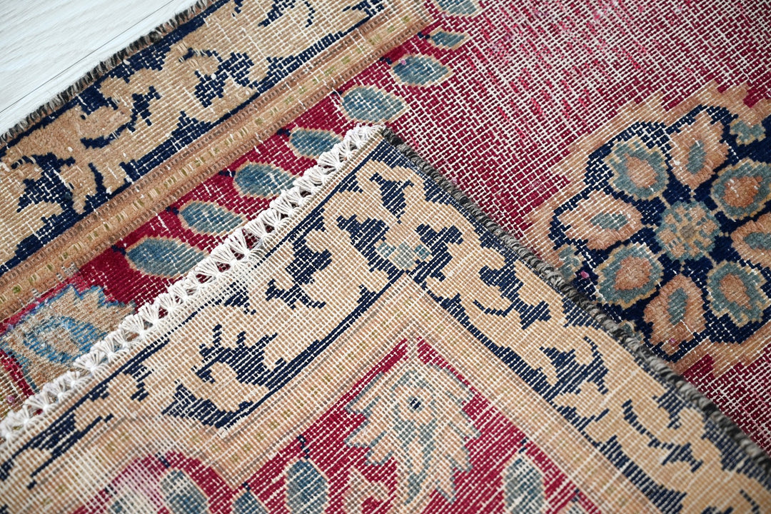 red Accent rug 1' 9" x 3' 0"