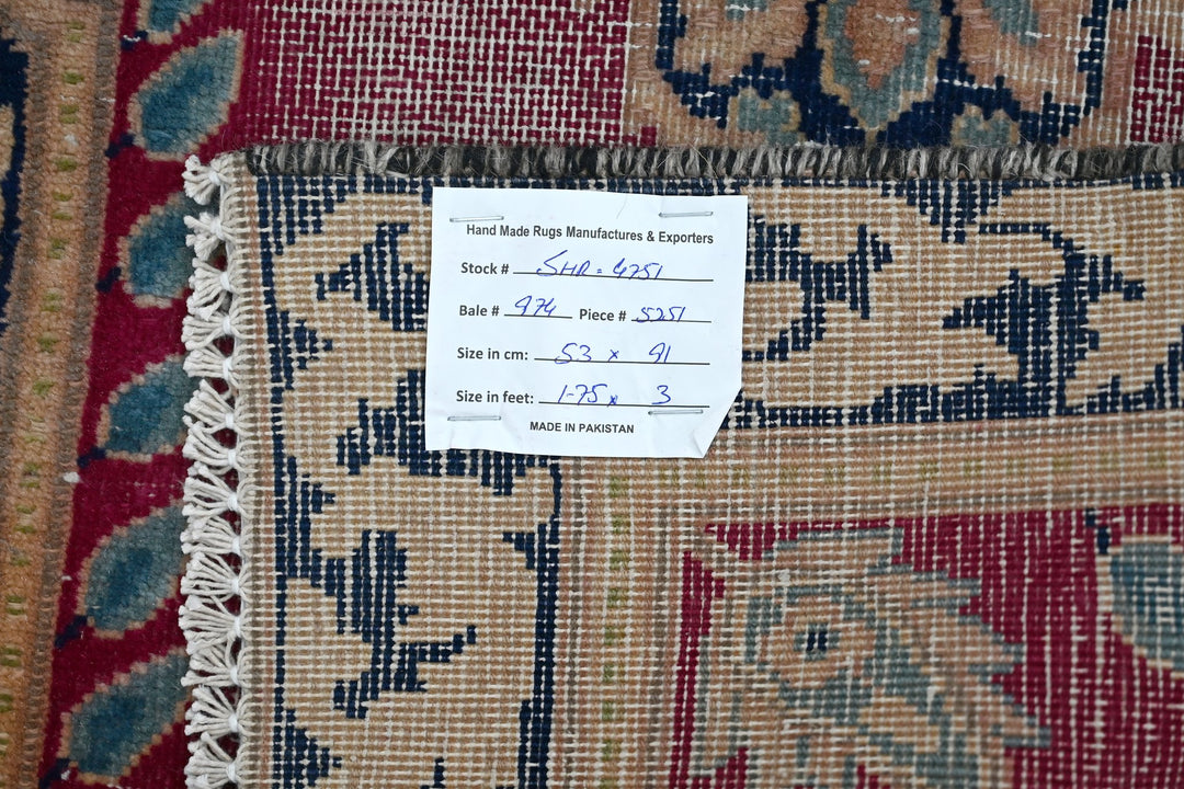 red Accent rug 1' 9" x 3' 0"