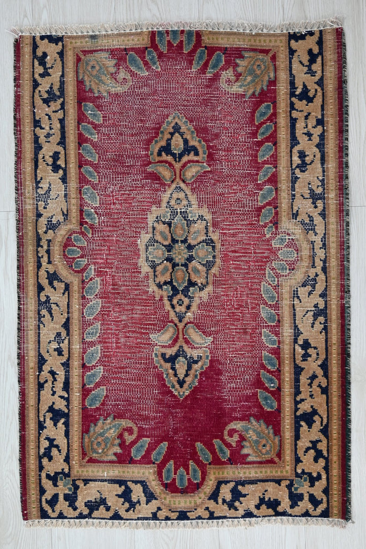 red Accent rug 1' 11" x 2' 10"