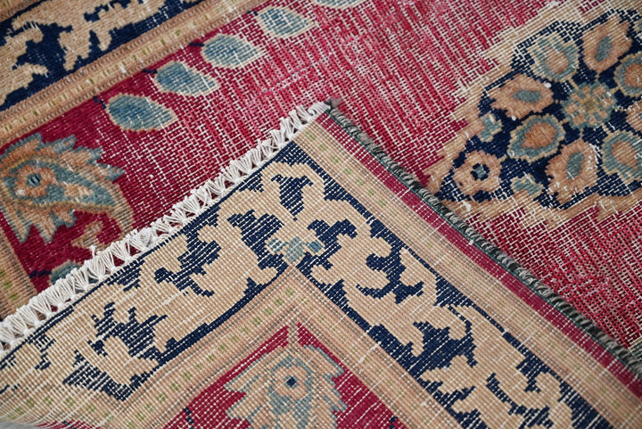 red Accent rug 1' 11" x 2' 10"