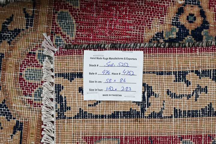 red Accent rug 1' 11" x 2' 10"