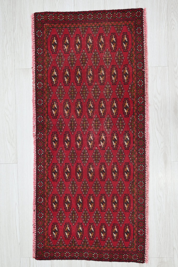 red Accent rug 1' 9" x 3' 10"