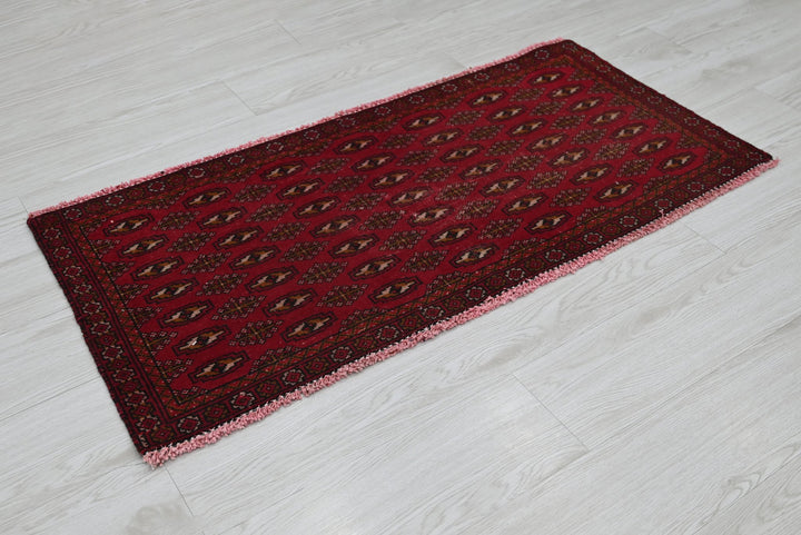 red Accent rug 1' 9" x 3' 10"