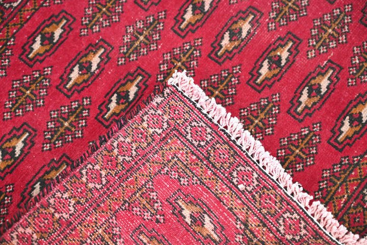 red Accent rug 1' 9" x 3' 10"