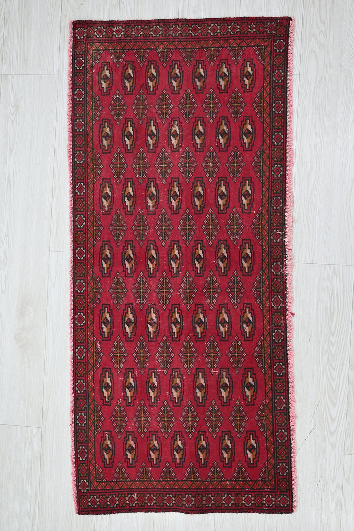 red Accent rug 1' 9" x 4' 0"