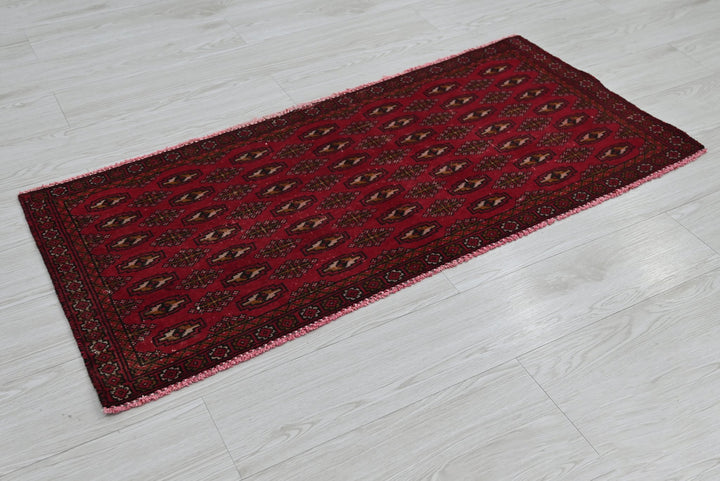 red Accent rug 1' 9" x 4' 0"