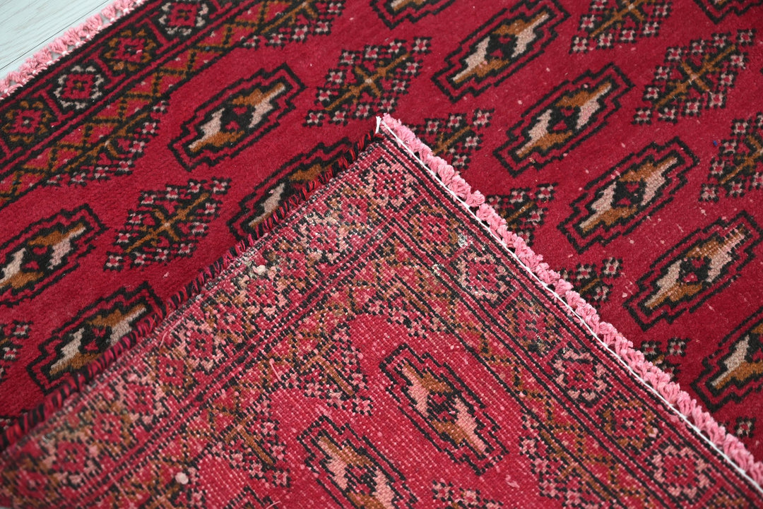 red Accent rug 1' 9" x 4' 0"