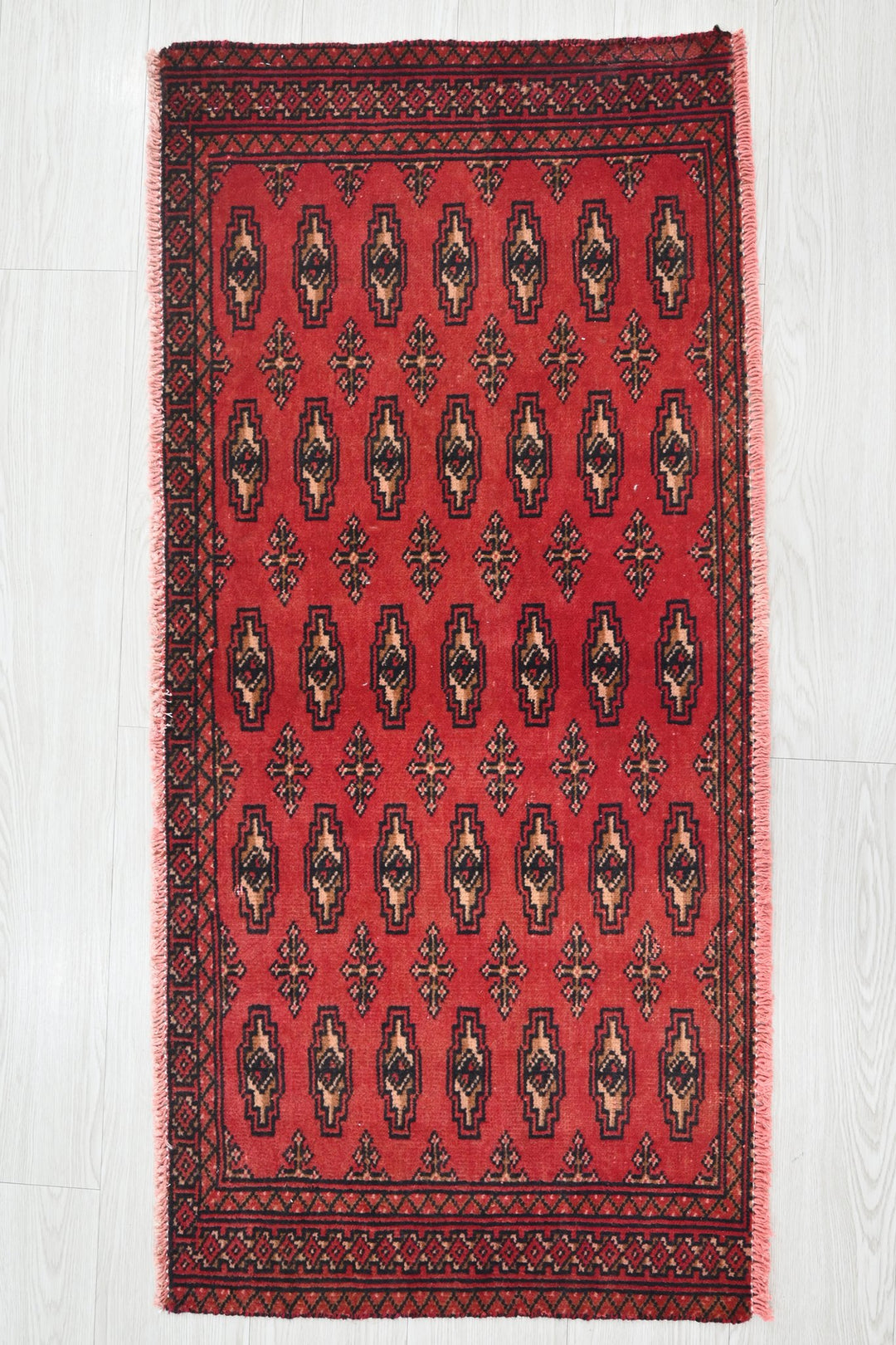 red Accent rug 1' 10" x 4' 1"