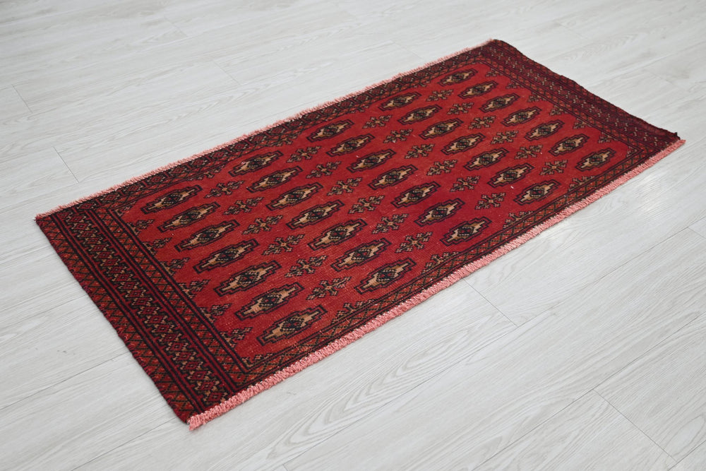 red Accent rug 1' 10" x 4' 1"