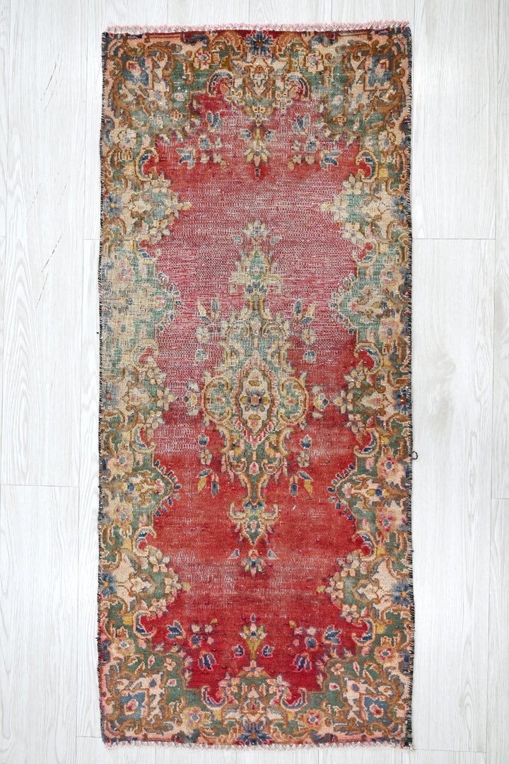 red Accent rug 1' 11" x 4' 2"