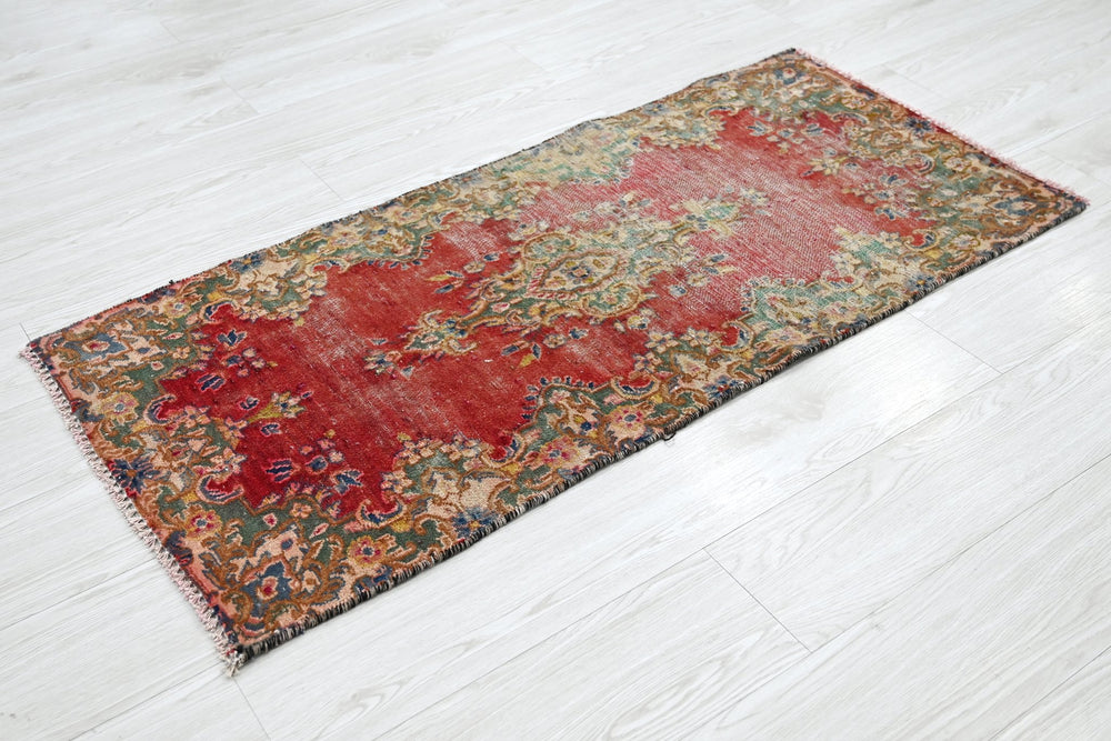 red Accent rug 1' 11" x 4' 2"