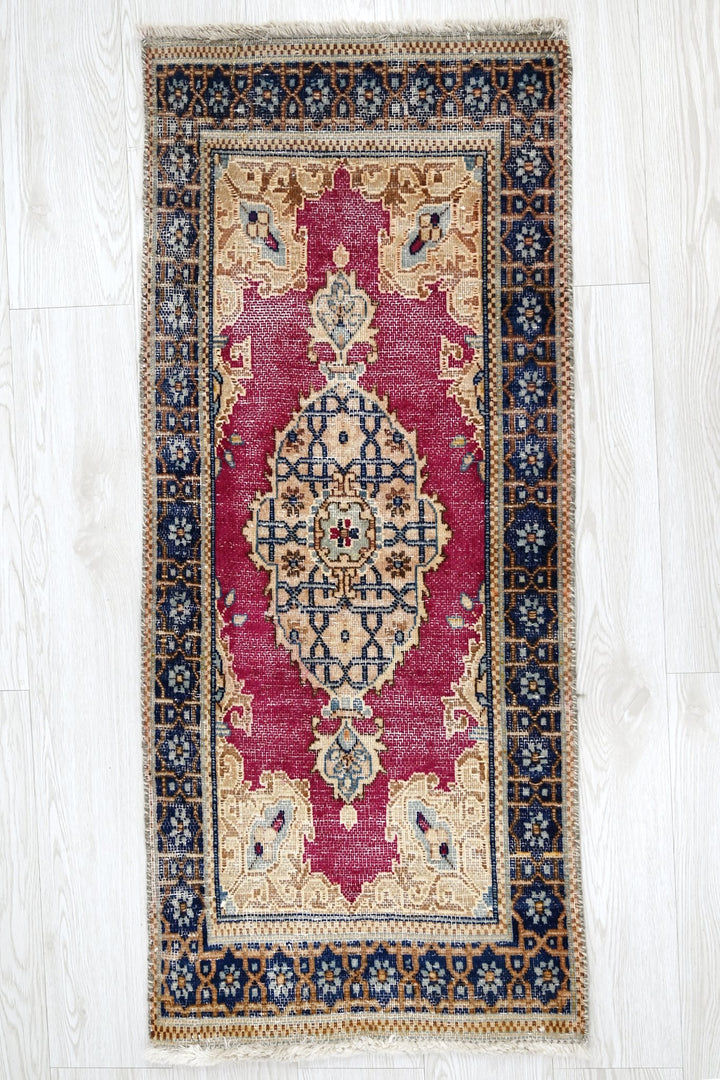 red Accent rug 1' 8" x 3' 10"