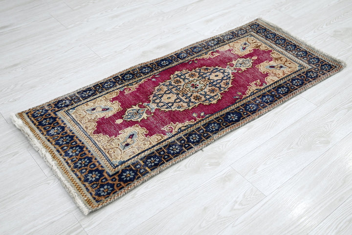 red Accent rug 1' 8" x 3' 10"