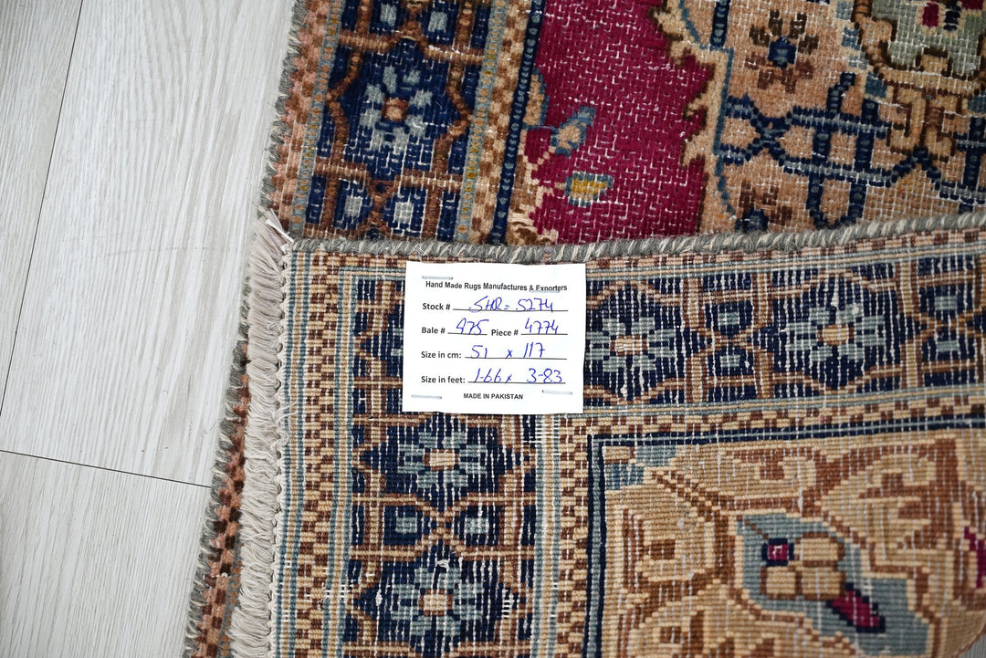red Accent rug 1' 8" x 3' 10"