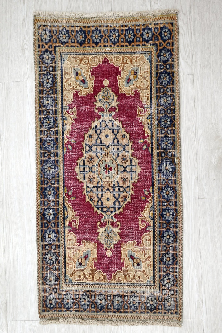 red Accent rug 1' 10" x 3' 8"