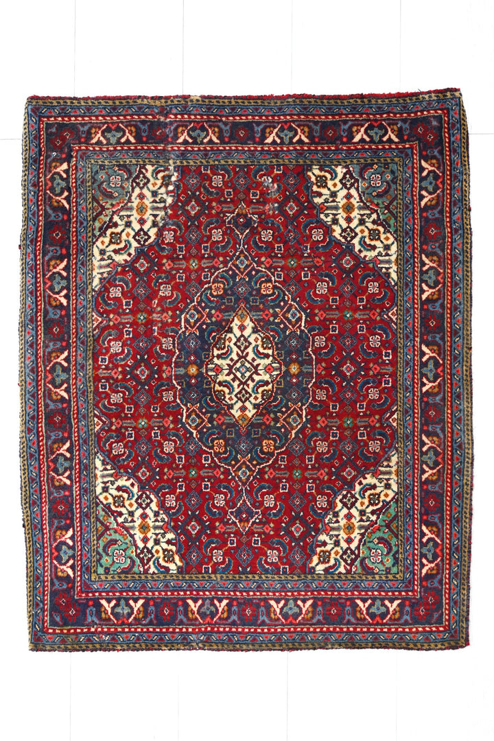 red Accent rug 2' 0" x 2' 5"