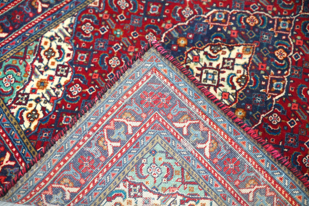 red Accent rug 2' 0" x 2' 5"
