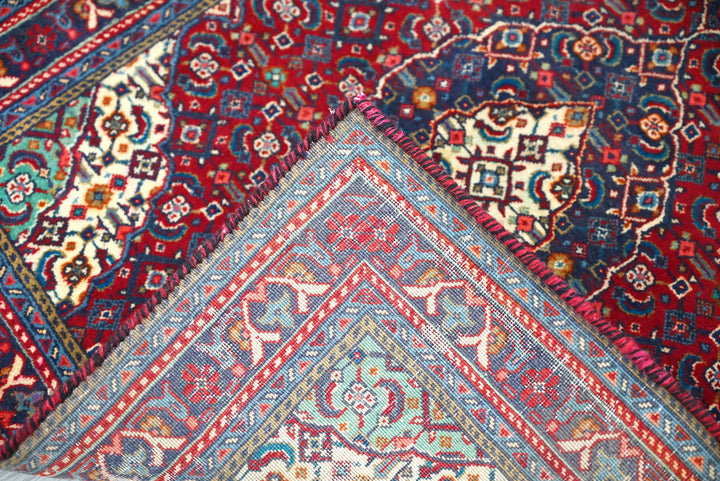 red Accent rug 2' 0" x 2' 5"
