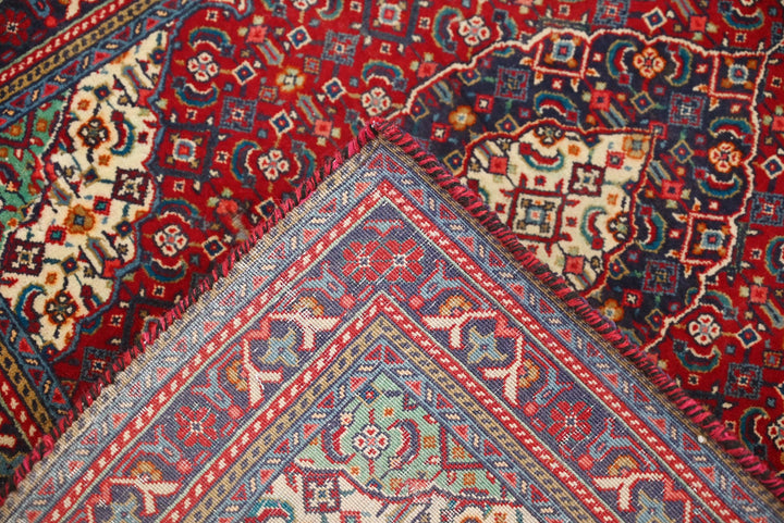 red Accent rug 2' 0" x 2' 6"