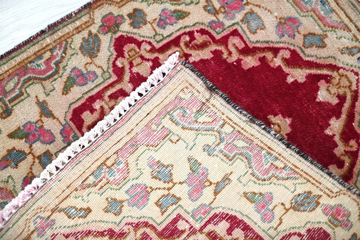 red Accent rug 1' 10" x 1' 10"