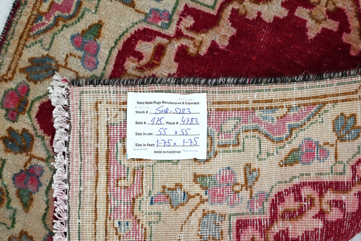 red Accent rug 1' 10" x 1' 10"
