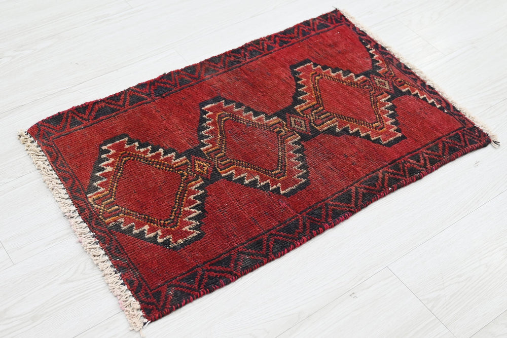red Mini rug 1' 5" x 2' 3"