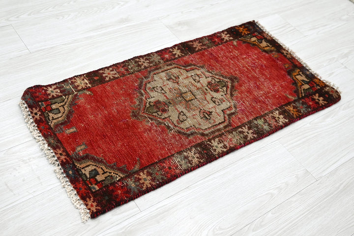 red Mini rug 1' 5" x 2' 10"