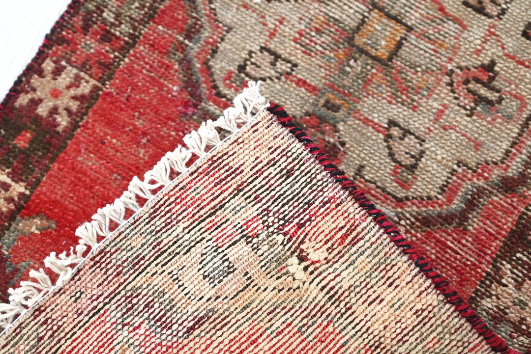 red Mini rug 1' 5" x 2' 10"