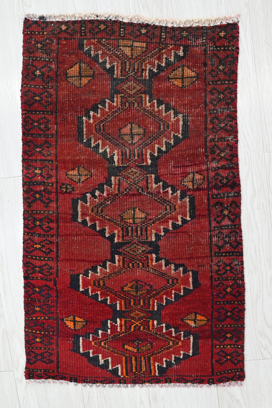 red Mini rug 1' 6" x 2' 7"