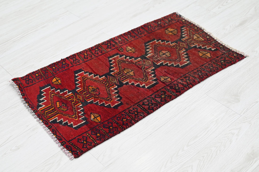 red Mini rug 1' 6" x 2' 7"