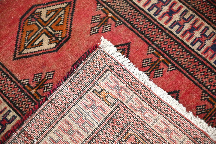 red Accent rug 1' 10" x 2' 9"