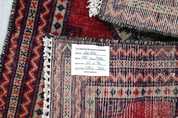 red Accent rug 1' 8" x 2' 5"