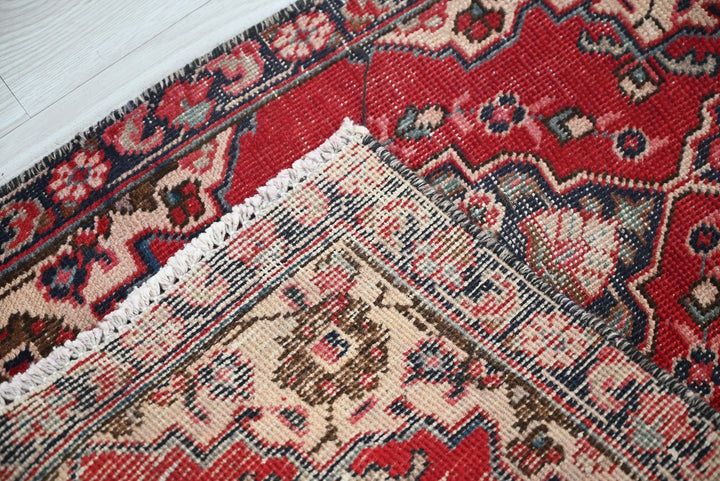 red Accent rug 1' 8" x 2' 4"