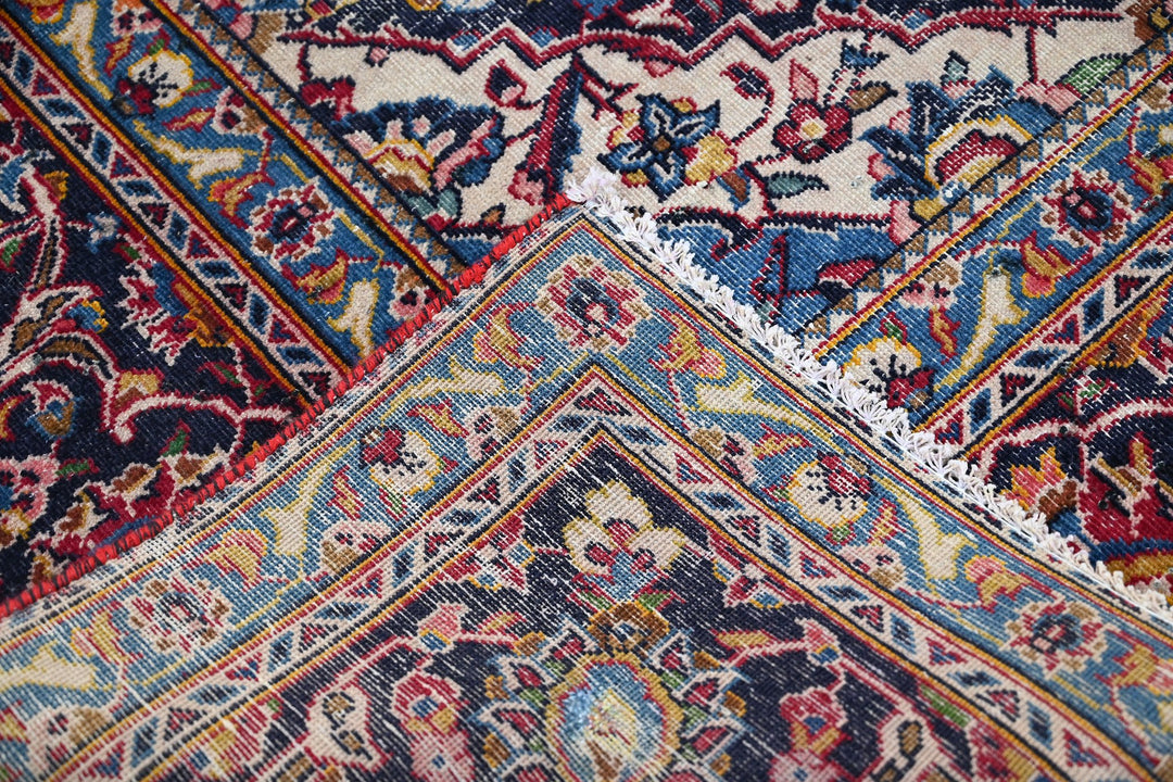 red Large rug 7' 10" x 11' 3"