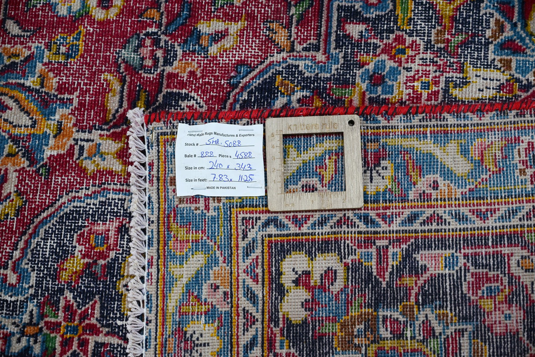 red Large rug 7' 10" x 11' 3"