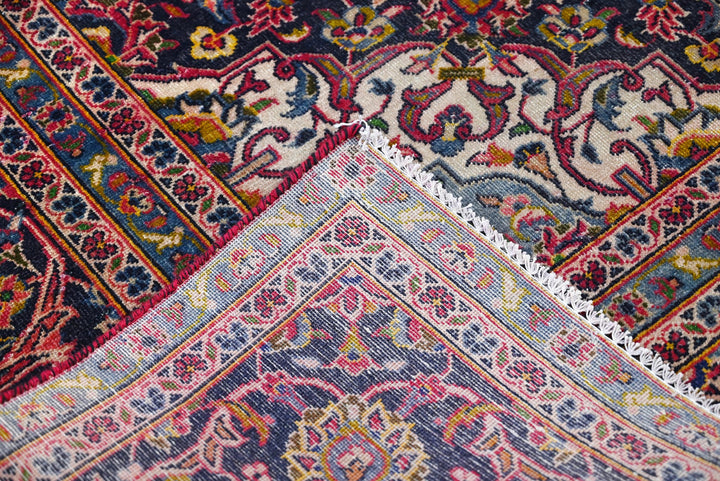 red Large rug 7' 5" x 10' 11"