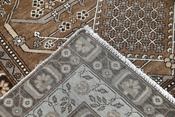 brown Large rug 8' 0" x 10' 10"