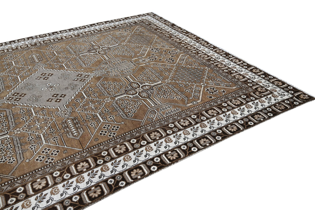 brown Large rug 8' 0" x 10' 10"