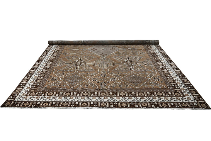 brown Large rug 8' 0" x 10' 10"