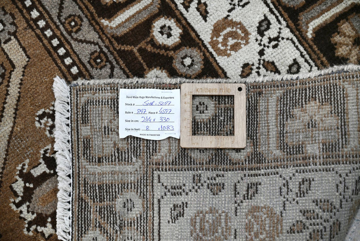 brown Large rug 8' 0" x 10' 10"