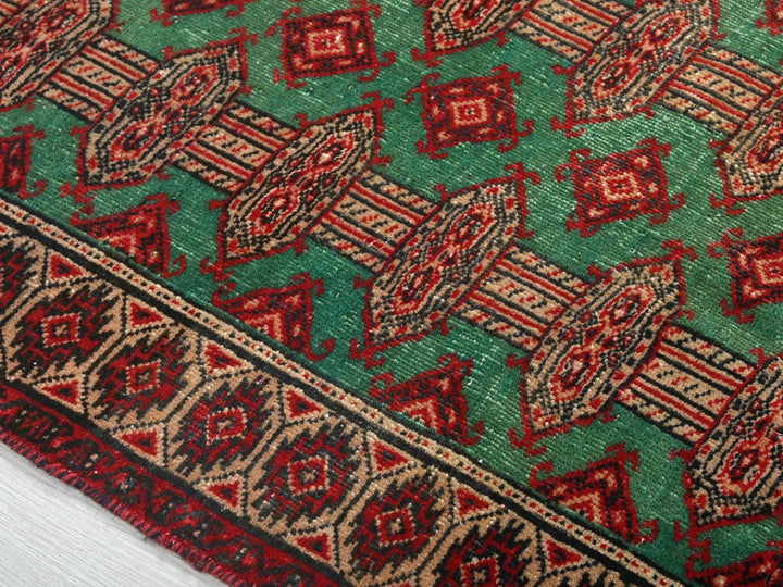 a close up of a rug on a white surface