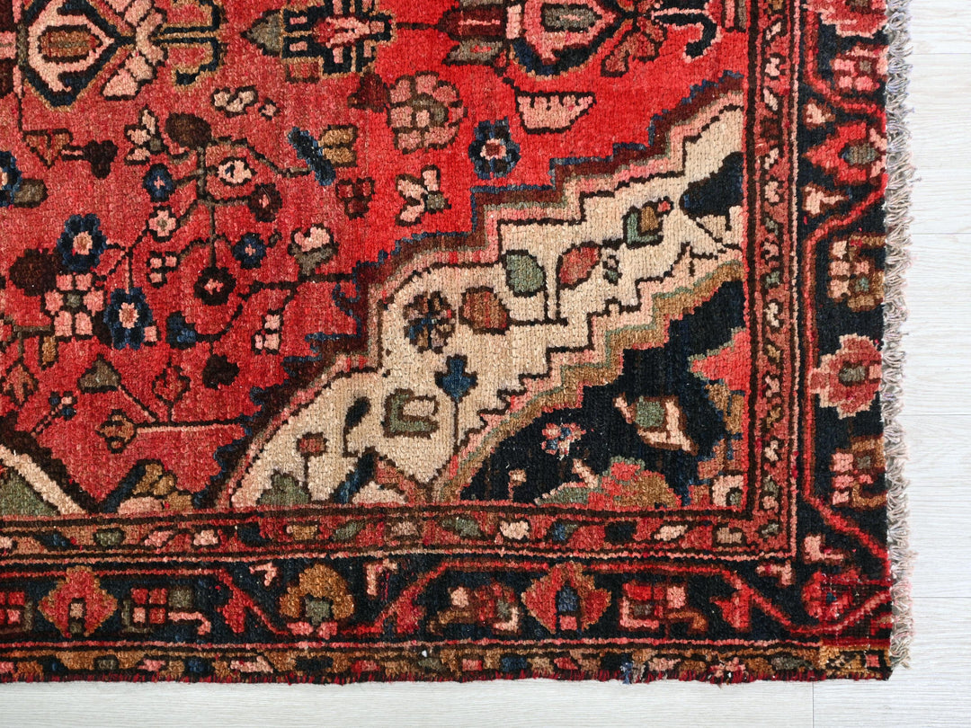 a red rug with a horse on it