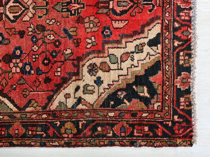 a red rug with a horse on it